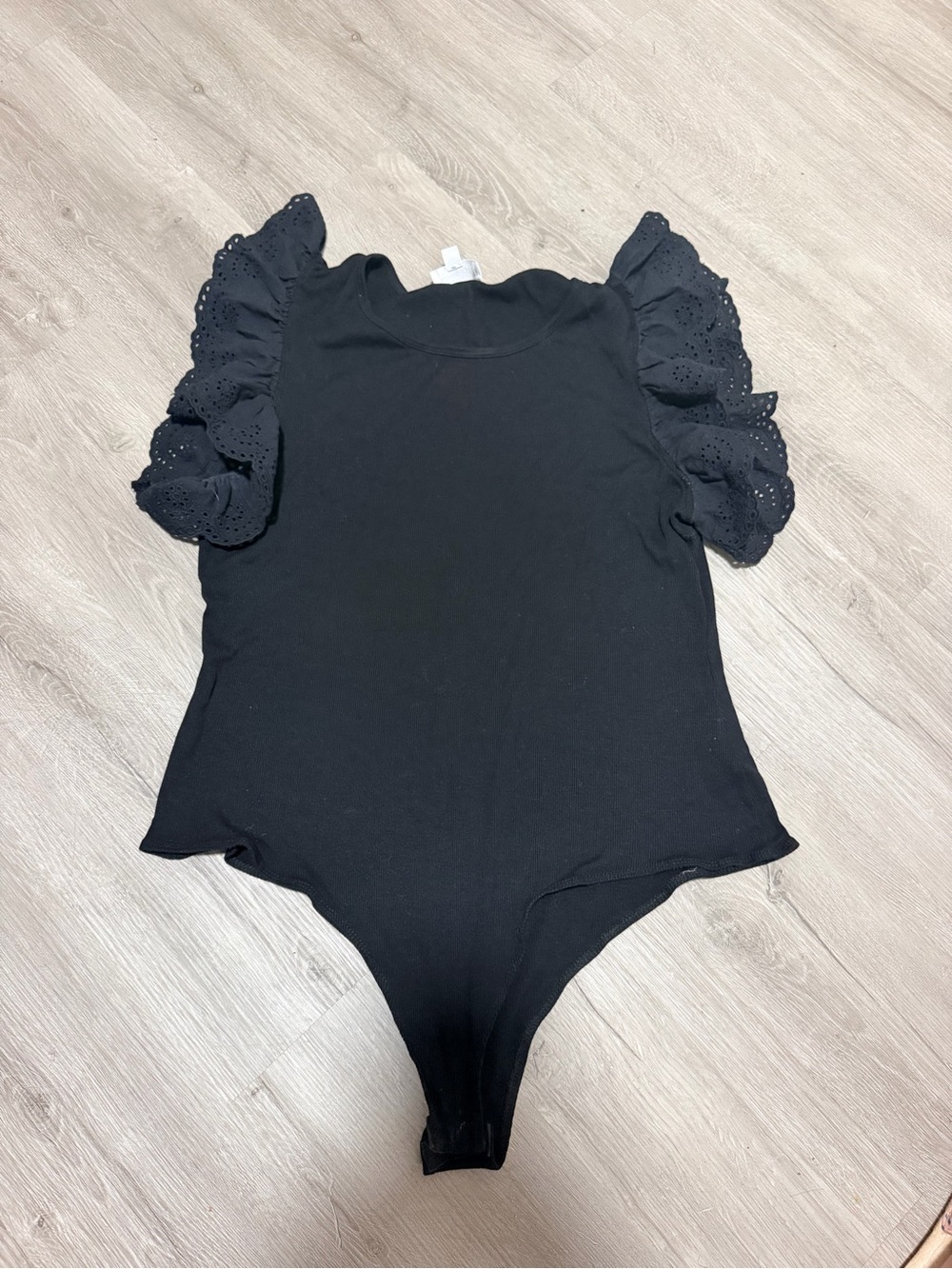 Kaileigh Black Eyelet Ruffle Sleeve Bodysuit (Black)